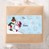 クリスマス雪だるまと女性キスのToおよびFrom ラベル (インサイチュ)