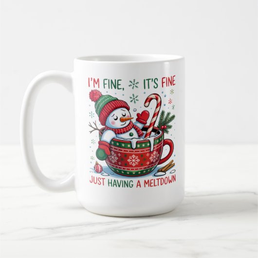 クリスマス雪だるまメルトダウンココアを持っていると思う コーヒーマグカップ (左)