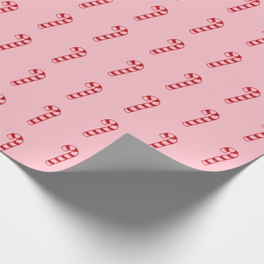 クリスマス飴のピンクの赤のパターンかわいいガーリー ラッピングペーパー (角)