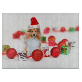 クリスマス飾り板を備えたシェットランド・ シープドッグ カッティングボード