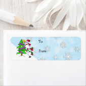 クリスマス飾雪だるまの木の向こうと向こうの ラベル (インサイチュ)