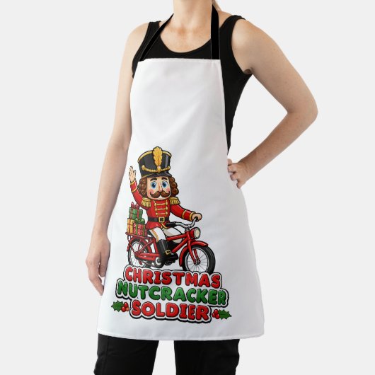 クリスマス・くるくる舞踊人形の兵隊の自転車乗り エプロン (インサイチュ)