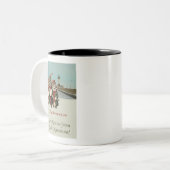 クリスマス・カロリング猫ダルース・ミネソタ ツートーンマグカップ (正面左)