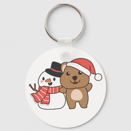 クリスマス・ケチャイで冬に雪だるまを持つQuokka キーホルダー (正面)