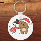 クリスマス・ケチャイで冬に雪だるまを持つQuokka キーホルダー (正面)
