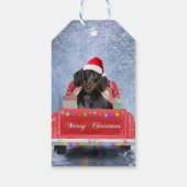 クリスマス・トラックに座って雪の中のダシュント犬 ギフトタグ (裏面)