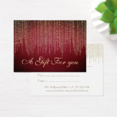 クリスマス/休日金ゴールドの目の前の赤いギフト証明書 (デスク)