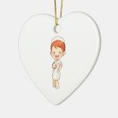 クリップボードを握っている赤毛の伝統的なナース セラミックオーナメント (左)