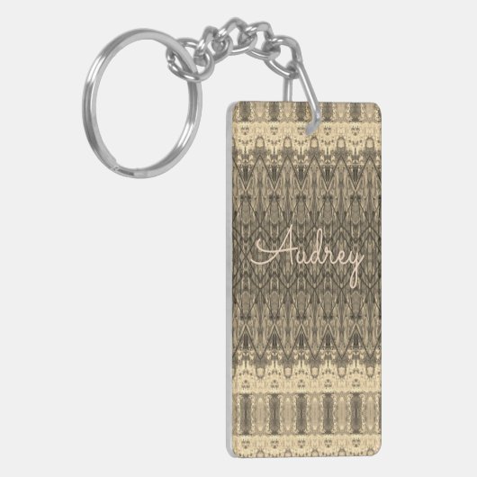 クリーミーレースのようグパターン(の模様が)ある キーホルダー (正面左)