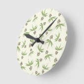 クリームに赤い枝の出芽 – シームレスなパターン。 ラウンド壁時計 (傾斜)