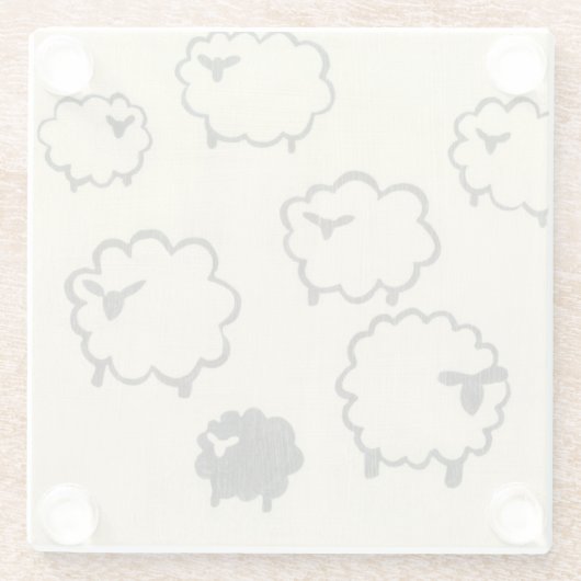 クリームの背景に白と黒の羊 ガラスコースター (裏面)