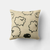 クリームの背景に白と黒の羊 クッション (裏面)