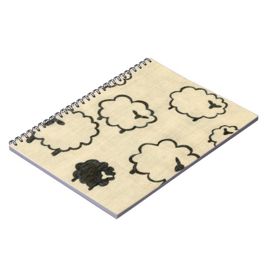 クリームの背景に白と黒の羊 ノートブック (左側)