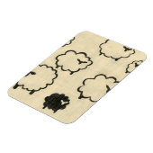 クリームの背景に白と黒の羊 マグネット (左側)