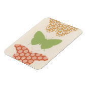 クリームの背景に飾り蝶のパターン マグネット (左側)