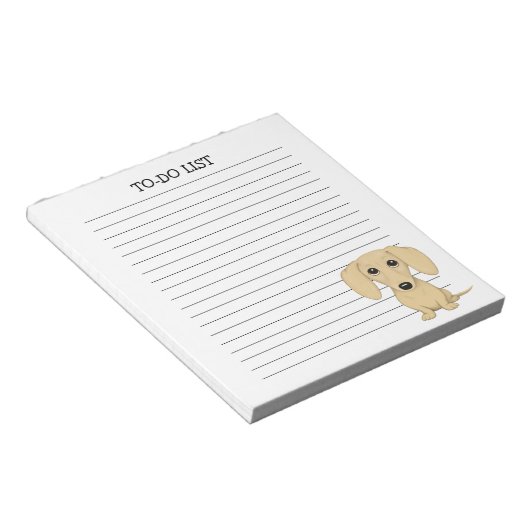 クリームダシュント |かわいい漫画ウィーナー犬が並ぶ ノートパッド (アングル)