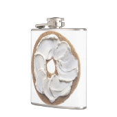 クリームチーズが付いているベーゲル フラスク (左)