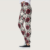 クリーム地に黒と深紅のミニマリストバラ レギンス (左)