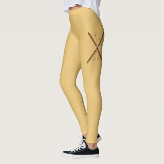 クロスカントリーのスキーとポール レギンス (左)