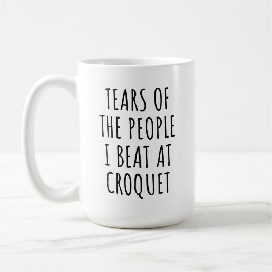 クロッケーで負かした人々の涙 ユーモア コーヒーマグカップ (左)