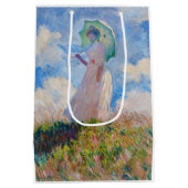 クロード・モネ – パラソルを向けた離れ女性 ミディアムペーパーバッグ (裏面)