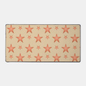 グラデーションのテラコッタオレンジ色の星模様 デスクマット (正面)