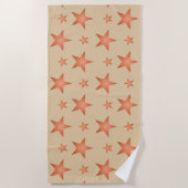 グラデーションのテラコッタオレンジ色の星模様 ビーチタオル (正面)