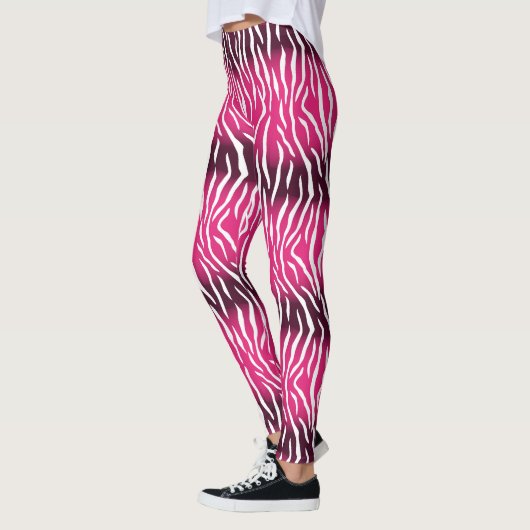 グラデーションピンクと白のトラのプリント レギンス (左)