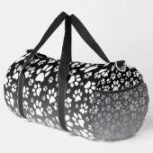 グラデーション背景の白いパターンの手 ダッフルバッグ (右コーナー)