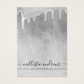 グラマラスなシルバー厚いグリッタードリップスロゴのイヤリング (正面)