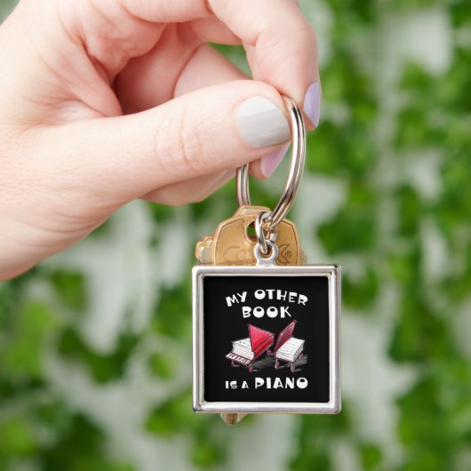 グランドアイディアオンホイール – 🎵ピアノ集 キーホルダー (手)