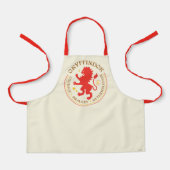 グリフィンドール™レッドライオンハウスプライドバッジ エプロン (正面)