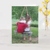 グリーティングカード:『木のスイングの少女たち』 カード (黄色い花)