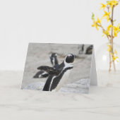 グリーティングカード – 羽ばたくペンギン (黄色い花)