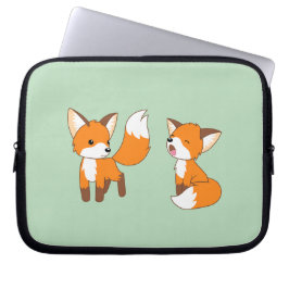グリーンのかわいい小キツネペア ラップトップスリーブ