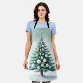 グリーンパインの木 | シルバーグリーンオレンジの球体 エプロン (着用した状態)