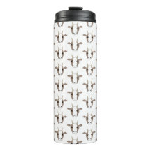 グレーと白のヤギがタンブラーに