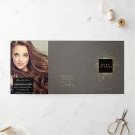 グレーなパンフレットに散らばった疑似ゴールドの紙吹雪 三つ折りカード