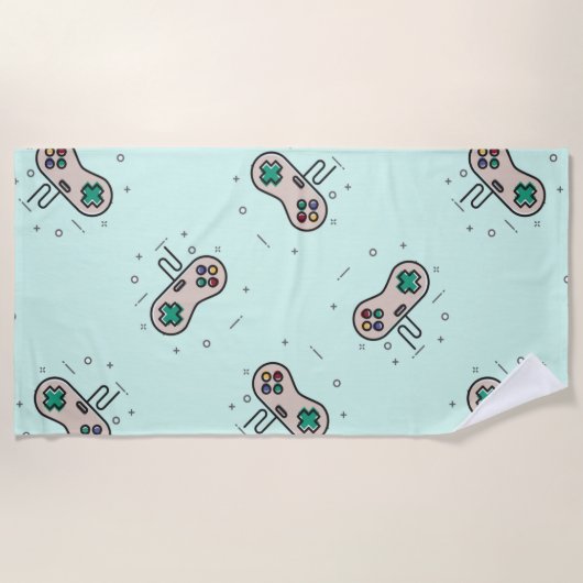 グレーのゲームジョイスティックを青で表示 ビーチタオル (正面)