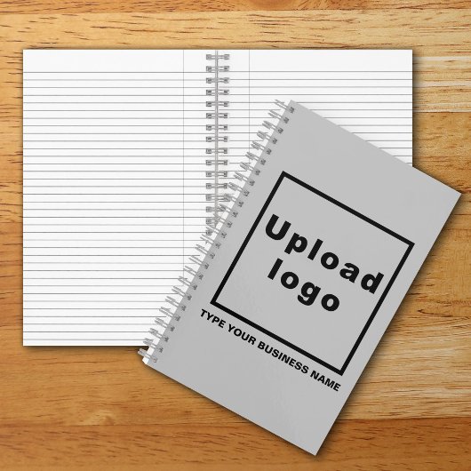 グレーのスパイラルノートブックのビジネス名とロゴ ノートブック