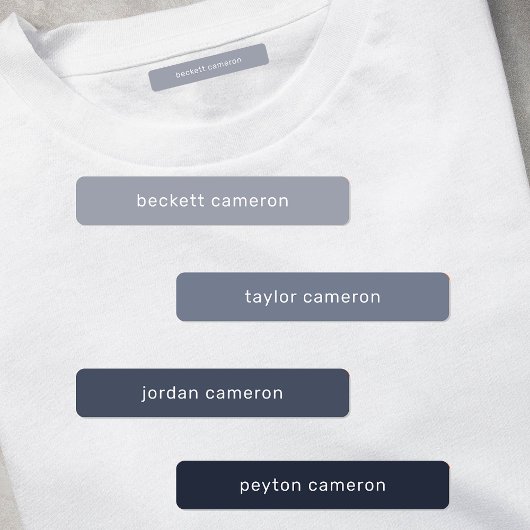 グレーの子供がアイロンを衣類に付ける ラベル