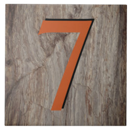 グレーストーンの上にある銅のグローハウス番号タイル7 タイル