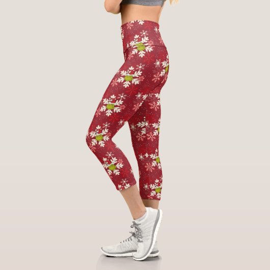 グレーチングレッド雪片パターン カプリレギンス (左)