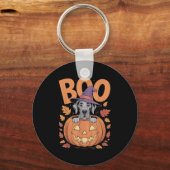 グレートデーンのコスチュームがオレンジ色のカボチャの上に ハロウィーン グレートデーン キーホルダー (正面)