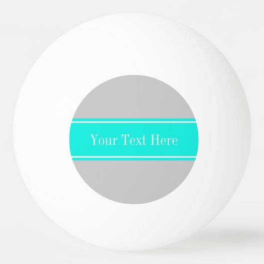 グレー無地のブライトアクアリボン名モノグラム 卓球ボール (裏面)