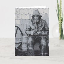 グロスターの漁師がカードを畳んだ網を修理