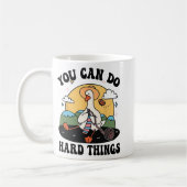 グース懸命事試験日 コーヒーマグカップ (左)