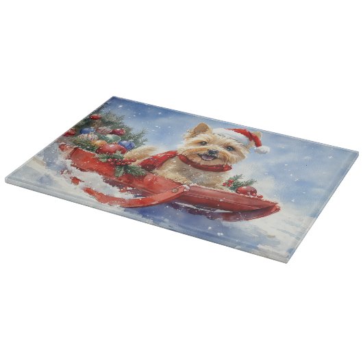 ケアン・テリア犬のソリでそれを雪のクリスマスに許可 カッティングボード (角)
