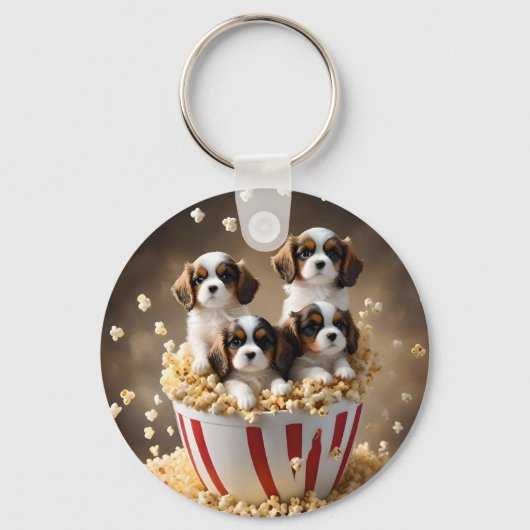 ケシのスパニエル犬の子犬たち キーホルダー (正面)