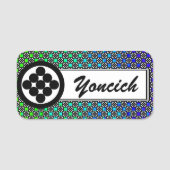 ケネス・ヨンシックによる九つの輪 名札 (正面)